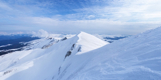 Winter landscape with a snowy mountain