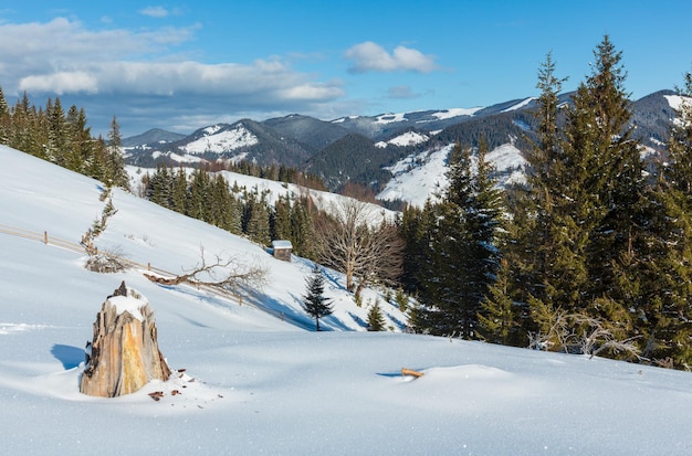 Winter mountain snow covered hill slope and stamp