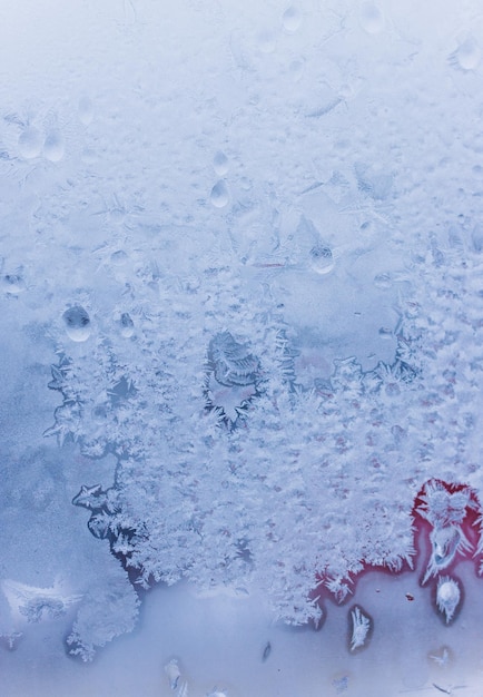 Winter natural background with frozen glass and beautiful unique texture