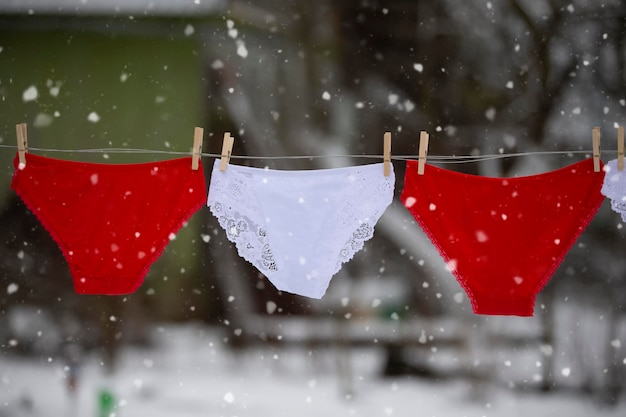 In winter panties dry on a rope outside