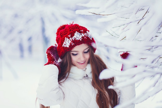 Winter portrait of young beautiful brunette woman