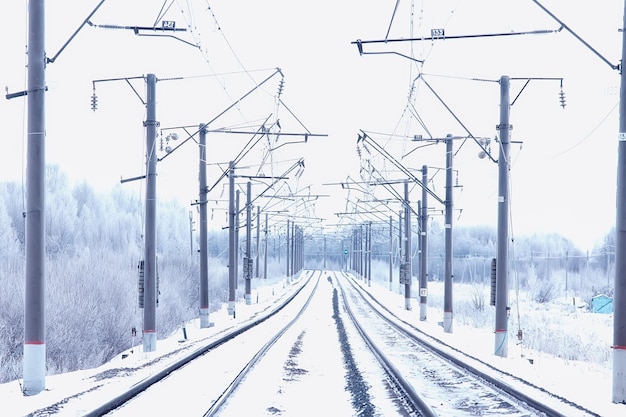 winter railway landscape, view of the rails and wires of the railway, winter delivery way