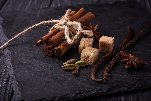 Winter spices cinnamon, anise, cardamom, vanilla. Selective focus