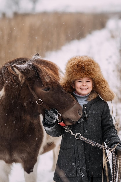 Winter story of friendship between a girl and a pony 3097