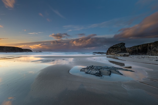 Winter sunset with reflections of clouds on the beach of Las Islas!