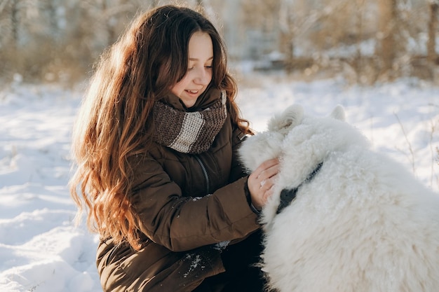 Winter walk with your favorite Samoyed pet