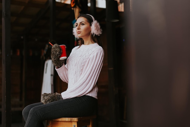 Winter woman with hot coffee