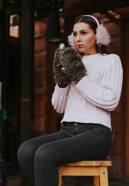 Winter woman with hot coffee