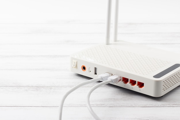 Wireless modem router network hub on wooden table