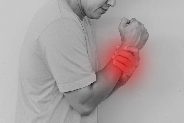 Wist arm pain injury mark red color black and white color broken bone human injury hand Health and care concept