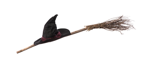 witch hat and broom isolated on white background