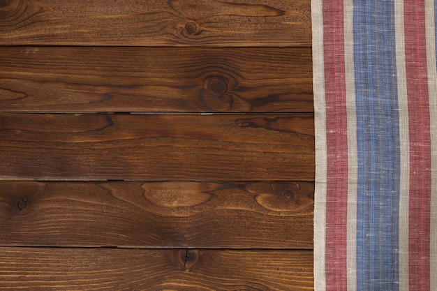   with empty wooden table with tablecloth