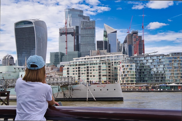 Woman admiring the city of london