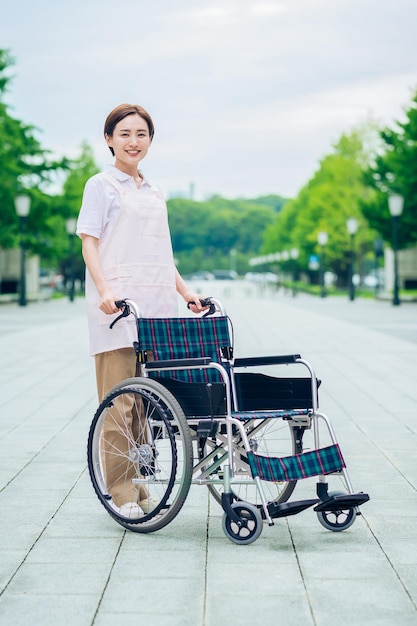 Woman in an apron and wheelchair