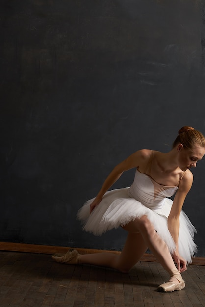 Woman ballerina in white tutu performance grace dance