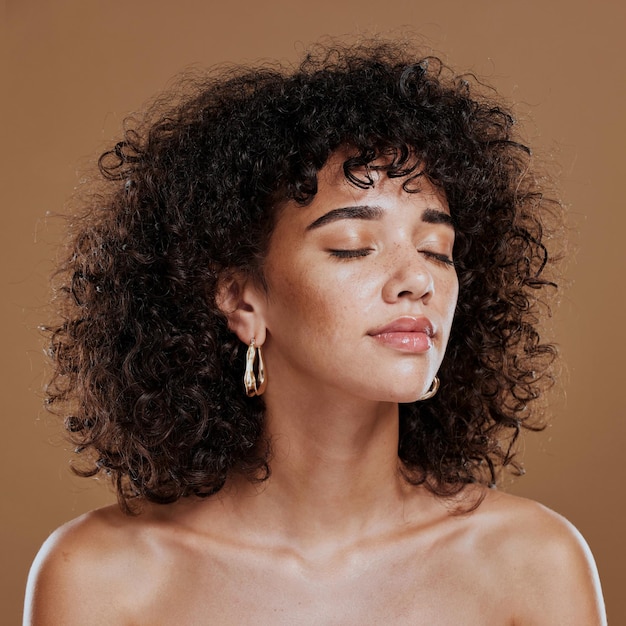 Woman beauty and freckles curly hair and facial treatment makeup and body care aesthetics shine or glow on studio background Young model melasma face and natural cosmetics skincare or wellness