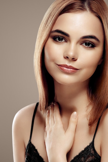 Woman beauty portrait on beige background