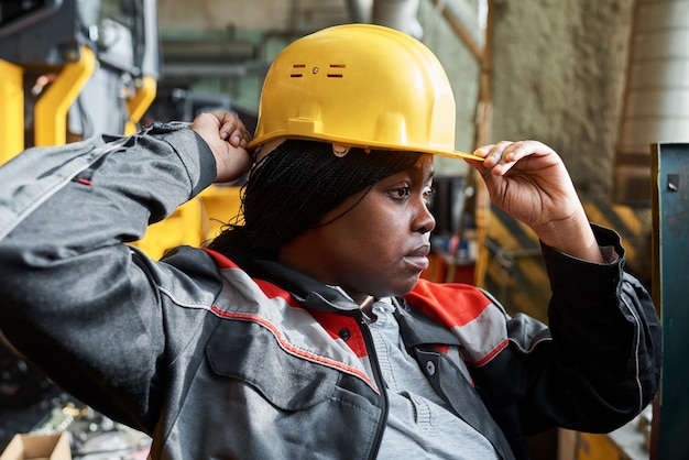 Woman beginning her work in factory