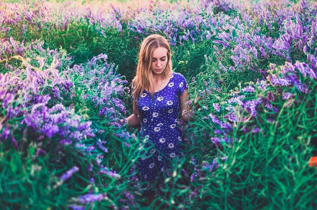 Woman in a blue dress with lavender