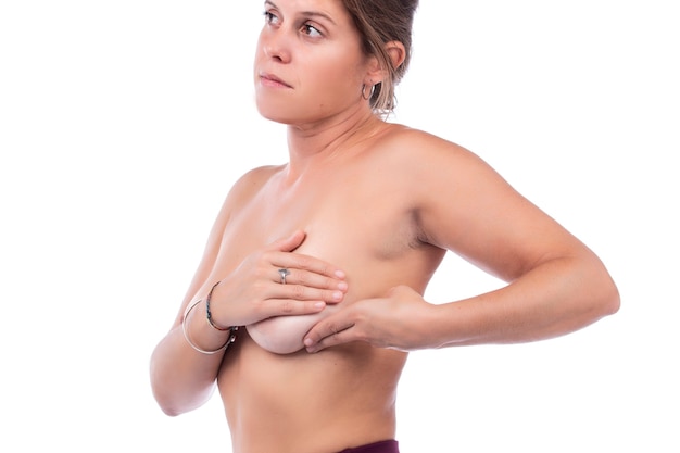 Woman Breast self care and examination for lumps or weird symptoms.