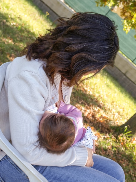 Woman breastfeeding baby