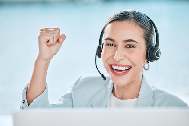 Woman call center portrait and fist celebration with smile for winning success or yes for customer service Girl telemarketing agent and happy with tech support help desk and celebrate promotion