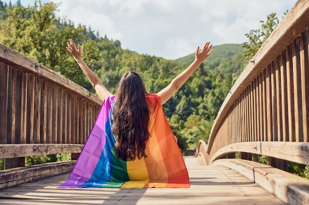 Woman celebrating with an lgbt flag. Lgbt concept