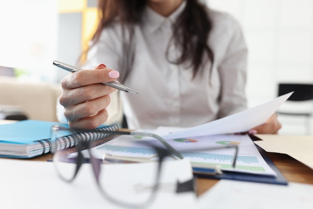 Woman checking documents in the office