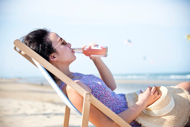 Woman chilling on the beach