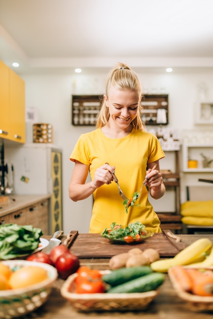 Woman cooking on the kitchen, eco food preparation