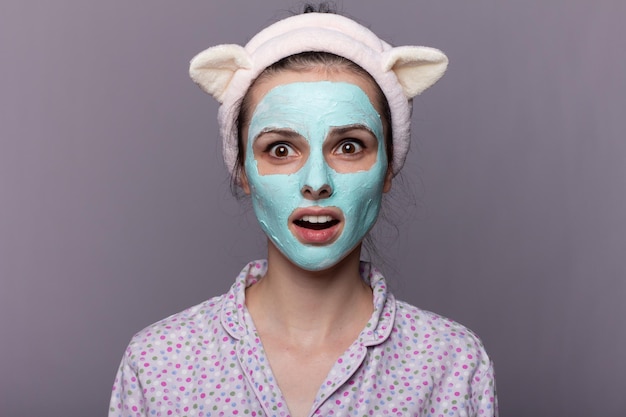 woman in cosmetic mask on her face