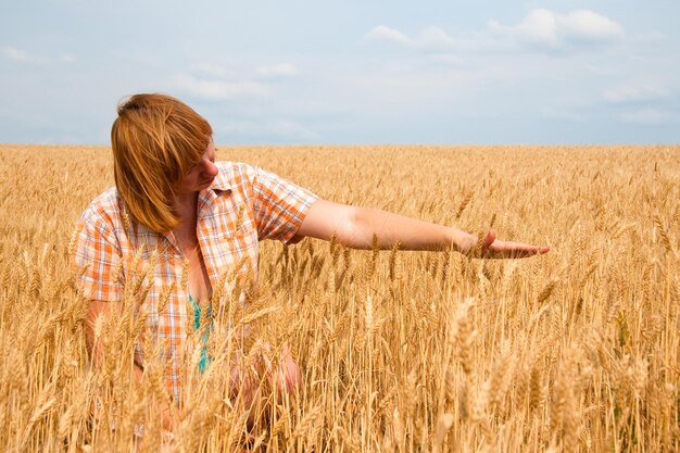 The woman and a crop