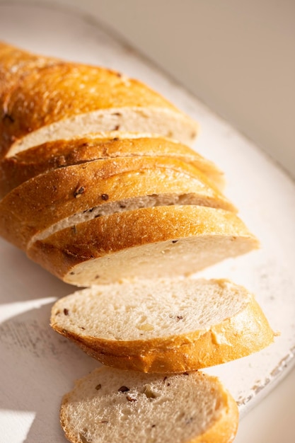 Woman cuts freshly baked bread