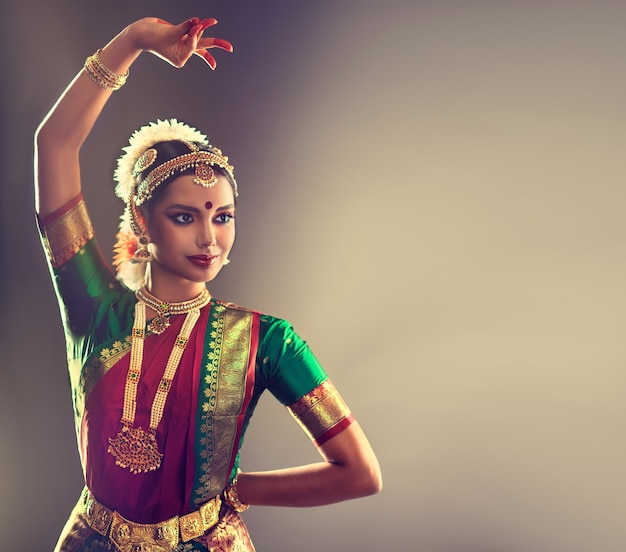 Woman dancer of folk Indian dance bharatanatyam Grace and beauty of traditional dance style