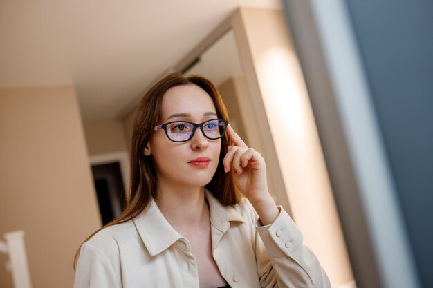 Woman designer working at home office on new ideas Young happy female freelancer working on project watching movie on computer studying blogging resting and chatting online