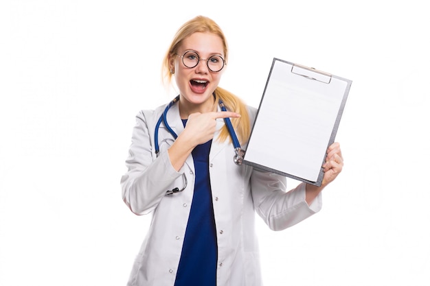 Woman doctor in white coat with clipboard