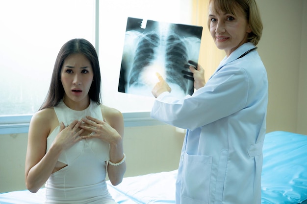 woman doctor with patients consultation friendly smiling reliable virology clinic.