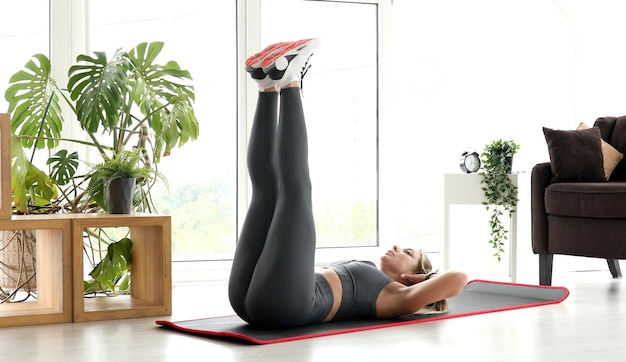 A woman doing a pilates exercise