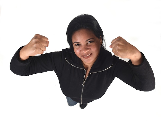 Woman doing strength on a white background