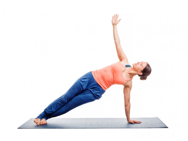 Woman doing yoga asana Vasisthasana