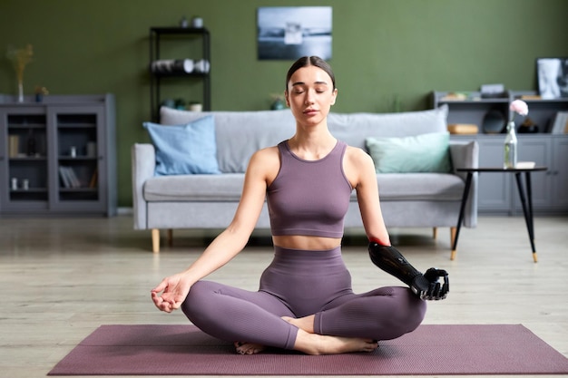 Woman doing yoga at home