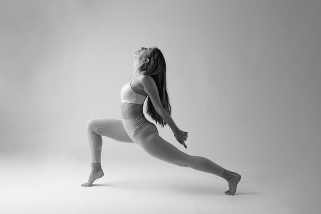 Woman doing a Yoga pose black and white photo