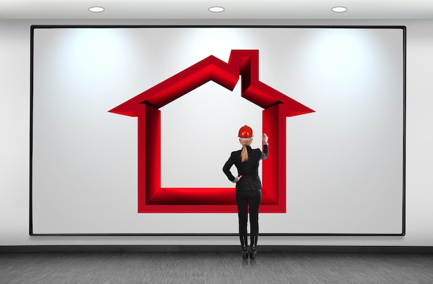 Woman drawing red house