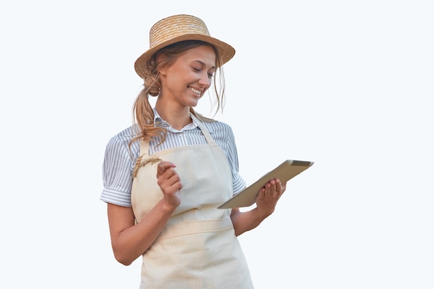 Woman dressed apron with digital tablet white background Caucasian middle age female business owner in uniform