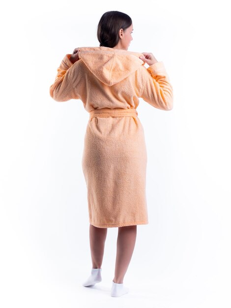 Woman in a dressing gown from the back on an isolated white background