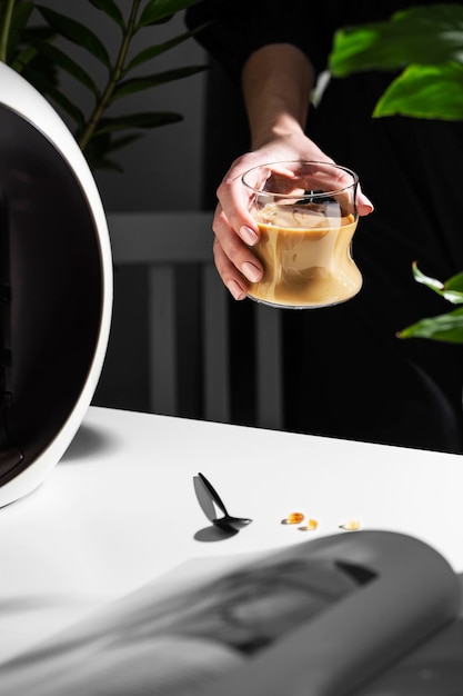 Woman drinking coffee with milk