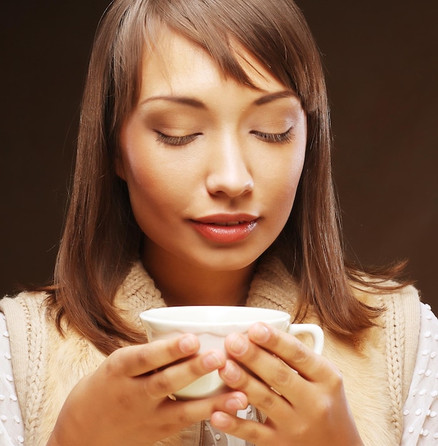 Woman drinking coffee