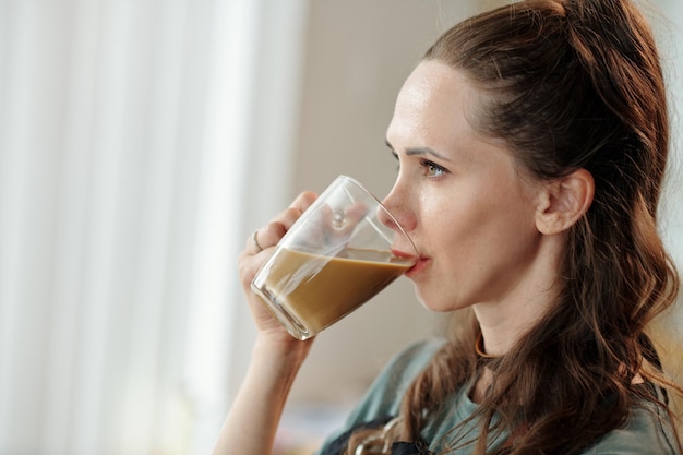 Woman Drinking Cup of Coffee