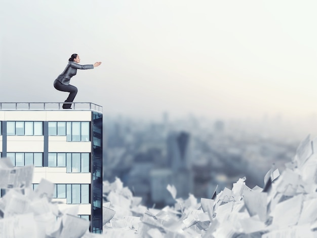 Woman on the edge of a high office building is going to jump to paperwork