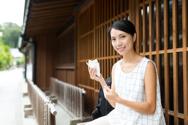 Woman enjoy snack at outdoor